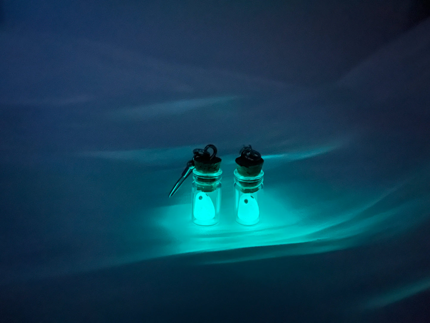 Luminous ghost earrings